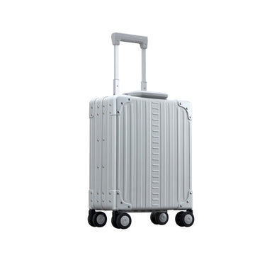 Aleon 16 inch vertical carry on briefcase that fits under your seat with wheels and telescoping handle side view, in silver.